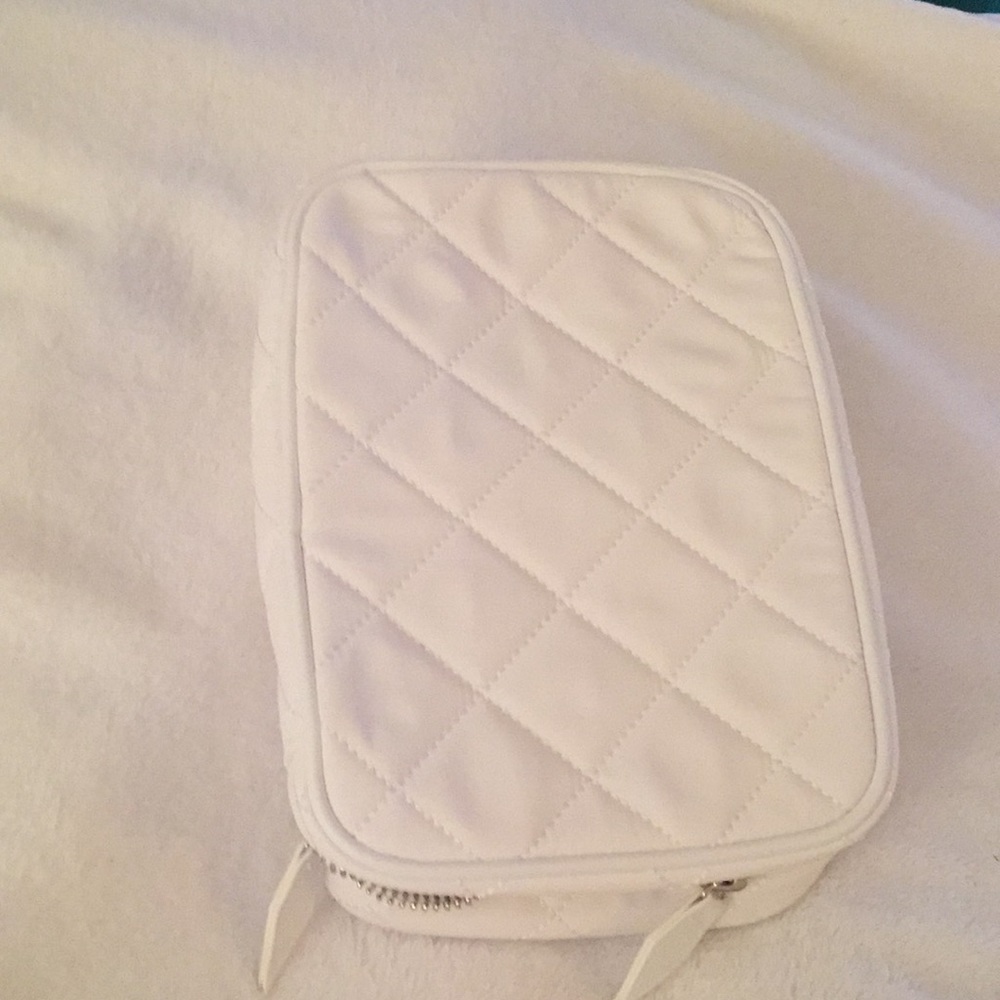 NEW Trish Mcevoy makeup bag in white.